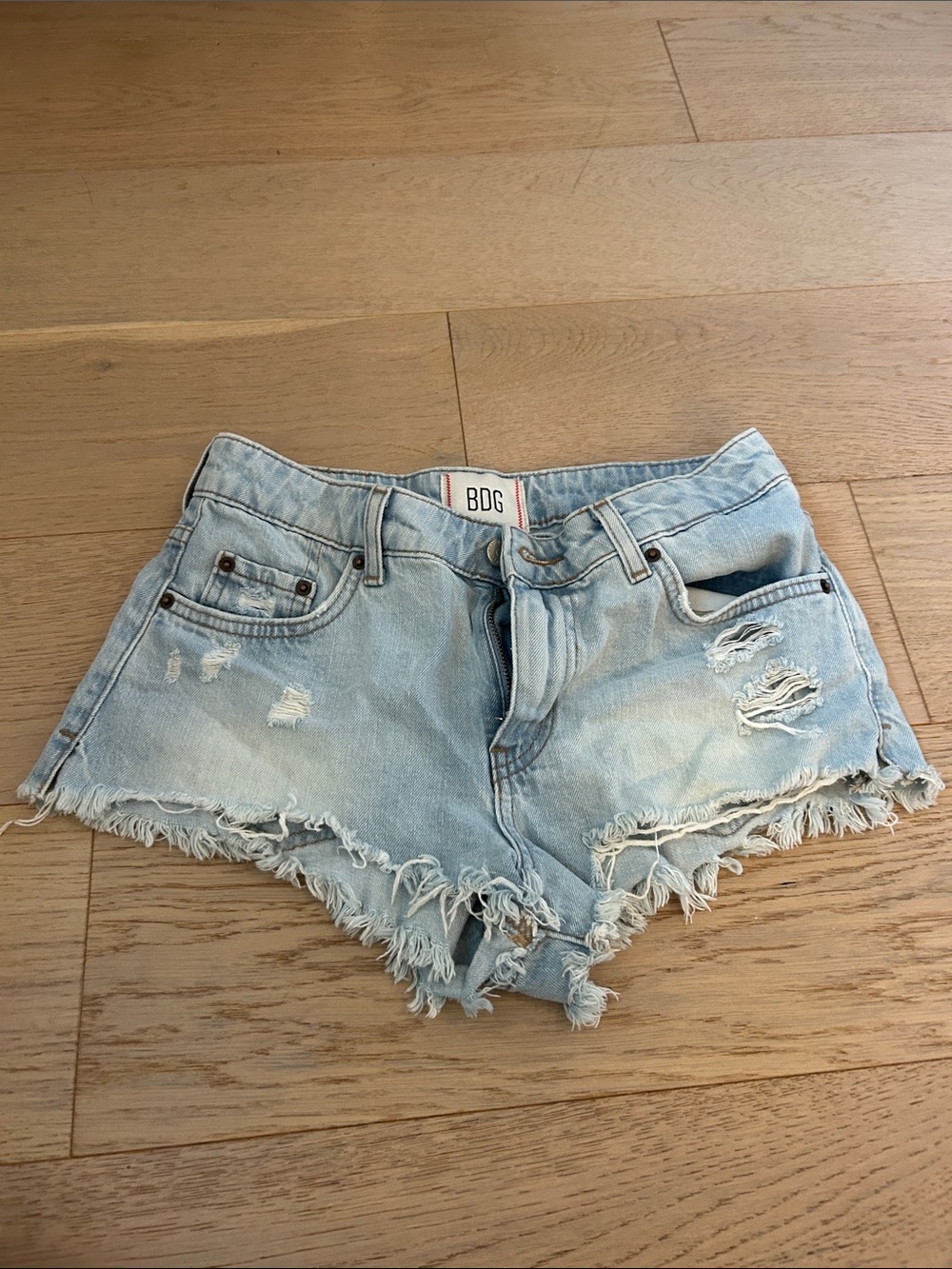 BDG (Urban Outfitters denim brand) low rise light wash distressed shorts